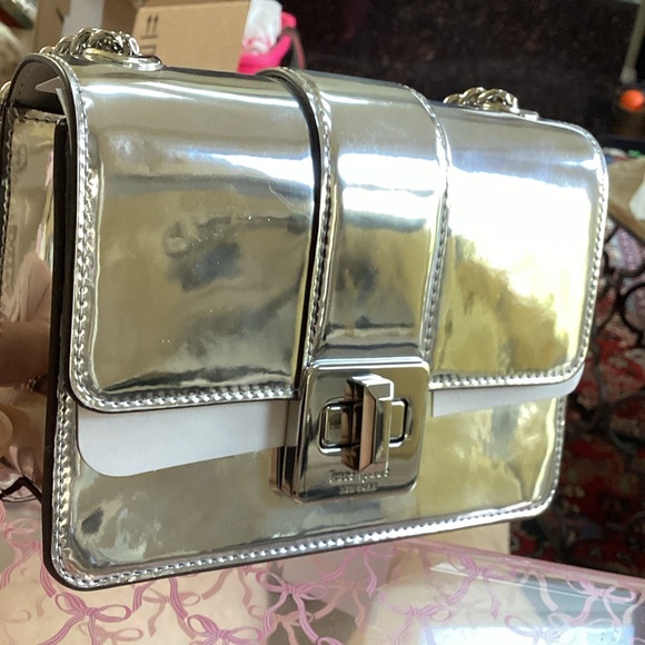 kate spade Handbags - Kate Spade Silver Crossbody Bag